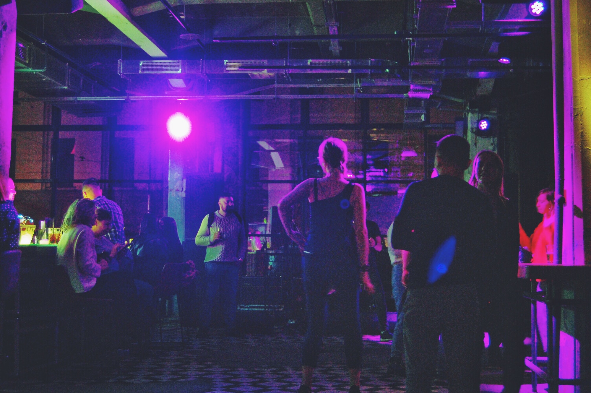 people on dance floor in night club jpg